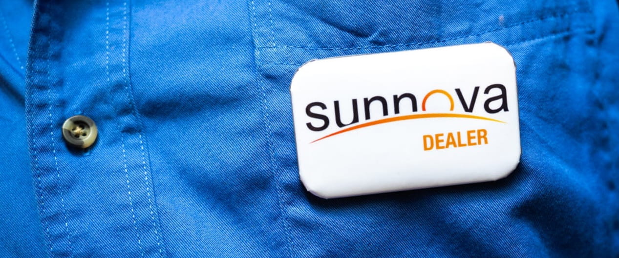 closeup of Sunnova dealer badge