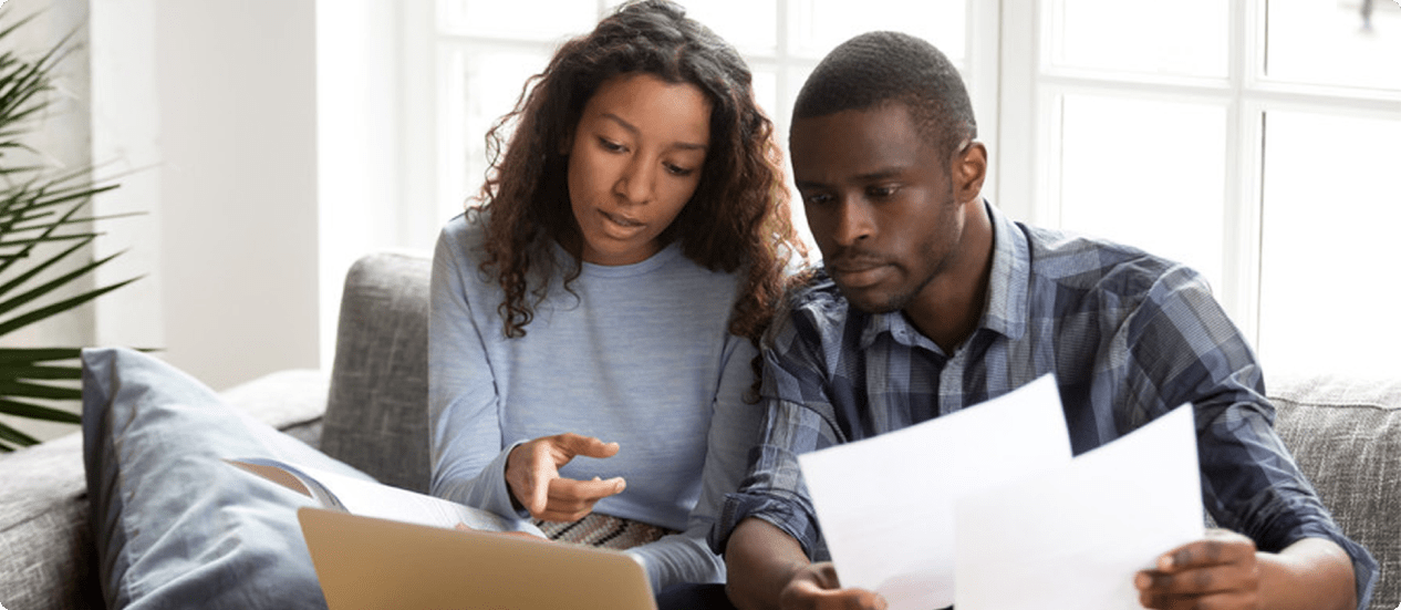 couple looking at paperwork